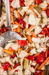 vegetable gerdener from tuscany street market, peppers, carrots,fennel, broccoli, cabbage