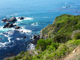 California coastal cliffs and jagged rocks in the ocean 