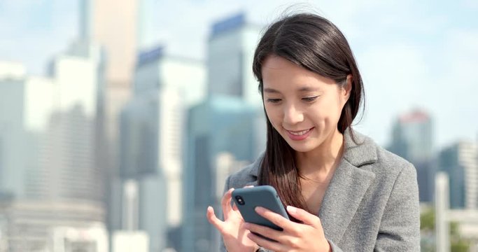 Asian business woman use of mobile phone