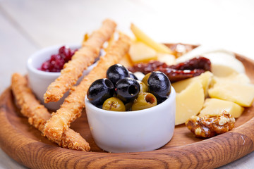 cheese plate with olives