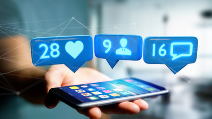 Businessman using a  smartphone with a Like, Follower and message notification on social network - 3d render