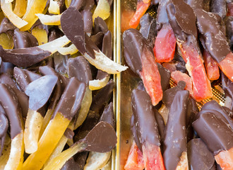 Candied fruit peel dipped in dark chocolate. Typical Sicilian Pastry, Italy
