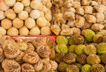 background of many pastries made with sweet almonds a typical Italian culinary specialty with candied fruit and pistachios