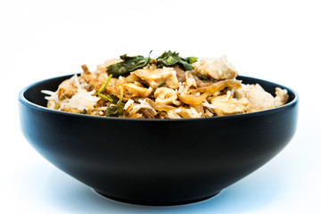 Homemade Chinese fried rice with vegetables and fried chicken