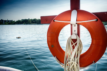 Lifebuoy hanging on boat
