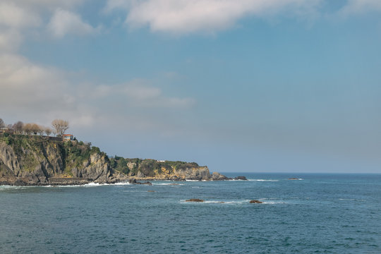 detail of the coastline with cliffs and rocks at atlantic ocean in spain