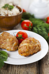 Delicious cutlets, tomatoes and parsley