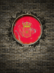 Old Navarra flag in brick wall