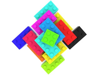 Fototapeta na wymiar Pyramid of colorful toy bricks top view 