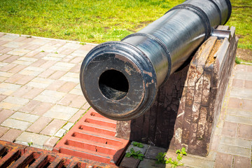 Black medieval cannon defends the city