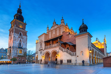 Obraz premium Town Hall tower and Krakow Cloth Hall at dusk, Poland
