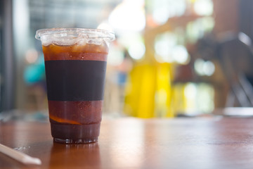 A glass of orange tonic cold brews coffee