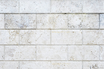 Old stone cladding plates on the wall closeup