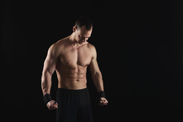 Fototapeta premium Strong athletic man showes naked muscular body