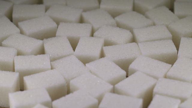 Shugar cubes close up on rotating table