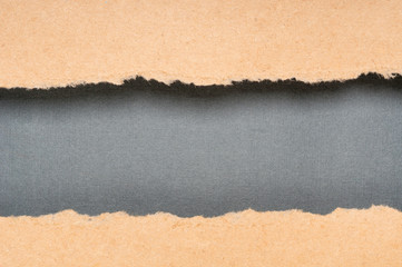 Brown torn paper with black copy space