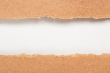 Brown torn paper with white copy space