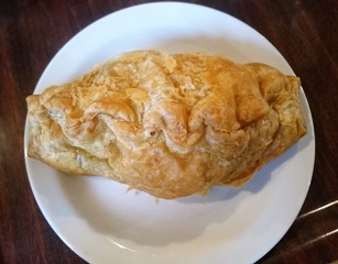 Cornish Pasty on a white plate