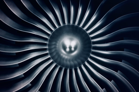 3D Rendering jet engine, close-up view jet engine blades. Blue tint.