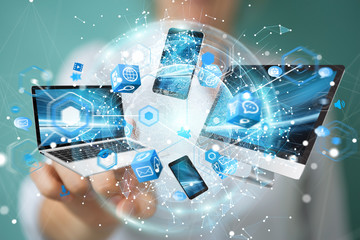 Tech devices connected to each other by businesswoman 3D rendering