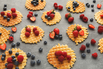 Obraz na płótnie Canvas Round belgium waffles with berries