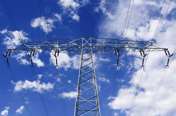Power Lines: Low-angle shot of a pylon of a 110 KV high-voltage power line