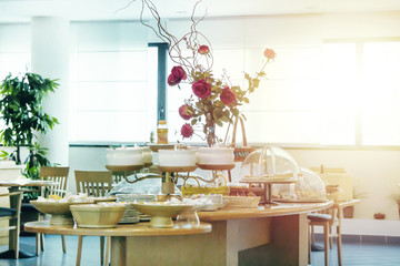 Soft focus, sweet buffet table service in breakfast room with vintage tone style.