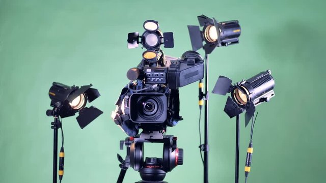 All the lights of a filming set are turning on one by one