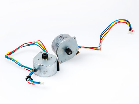 Stepper motors with wires and connectors, isolated on white