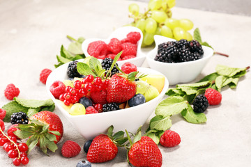 salad with fresh fruits and berries. healthy spring fruit salad