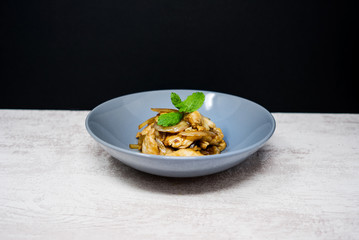 wok fried chicken stir fry with sweet peppers and chinese vegetables