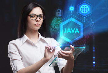 The concept of business, technology, the Internet and the network. A young entrepreneur working on a virtual screen of the future and sees the inscription: Java