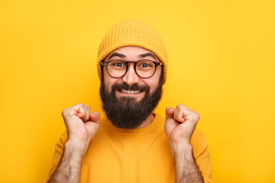 Cheerful excited hipster man