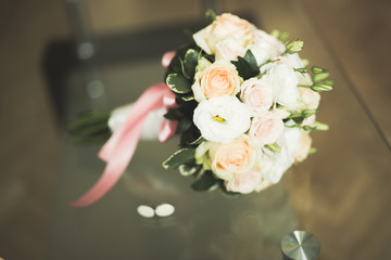 Beautiful wedding bouquet with different flowers, roses