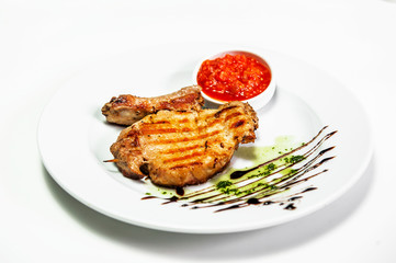 meat steak on a plate with sauce
