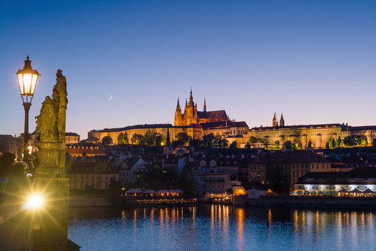 Prague, Bohemia, Czech Republic. Hradcany is the Praha Castle with churches, chapels, halls and towers. Evening view of the tourist attraction.