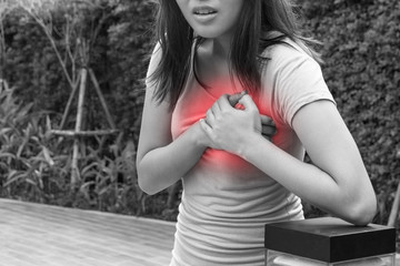 Sporty woman having heart attack - Angina Pectoris, Myocardial Infarction