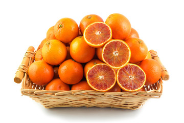 Fresh orange, organic ripe mandarins, pile of orange, sliced orange in wood basket on white background with clipping path.