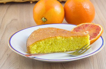 Cake, Homemade cakes come from citrus fruits and orange slide in plate on wood table background.