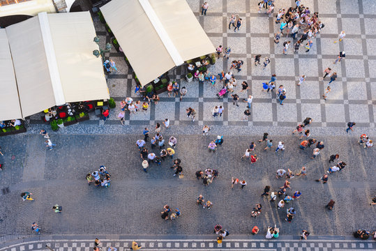 PRAGUE, CZECH REPUBLIC - MAY 2017: Aerial View of people visiting the Old Town Square from on top Old Town Hall tower in Prague, Czech Republic