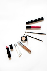 Fashionable Women's Cosmetics and Accessories. Falt Lay. Lipstick, shadows, brushes, phone. Make Up Cosmetic items Top View