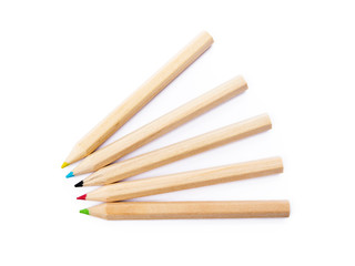 Wooden colorful ordinary pencils isolated on a white background