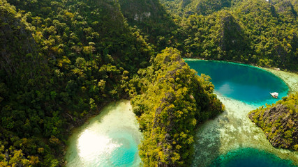 Very beautyful lagoon with boats. Paradise islands in Philippines. Kayangan Lake. © Довидович Михаил