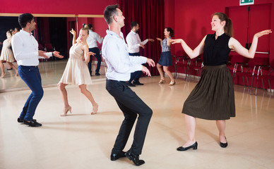 People practicing twist movements