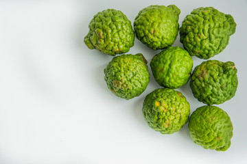 Bergamot on the white background. Citrus bergamia, the bergamot orange is a fragrant citrus with a yellow or green color similar to a lime.