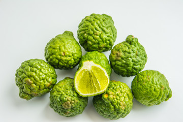 Bergamot on the white background. Citrus bergamia, the bergamot orange is a fragrant citrus with a yellow or green color similar to a lime.