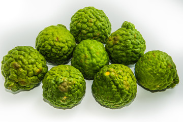 Bergamot on the white background. Citrus bergamia, the bergamot orange is a fragrant citrus with a yellow or green color similar to a lime.