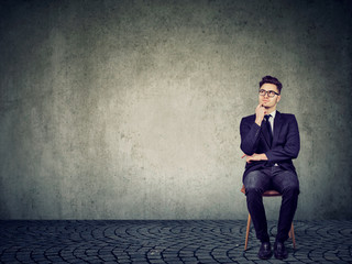 Thinking man creating business plan