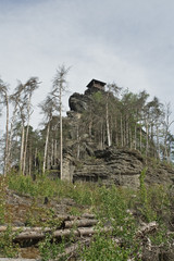 Fototapeta na wymiar Stone mountain with small house.
