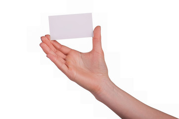 Well-groomed female hand with manicure and red lacquer holding an empty white card
